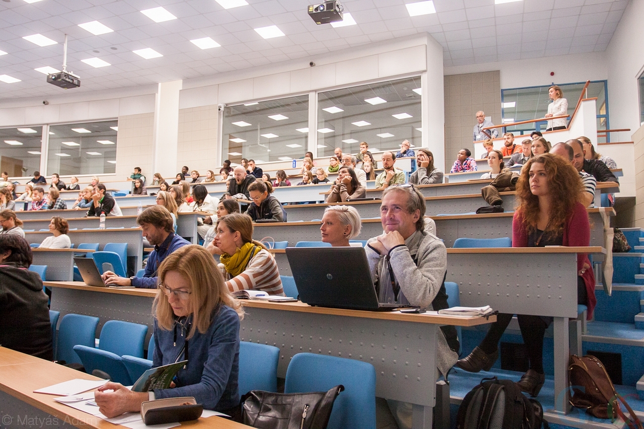 Audience listening to a presentation.